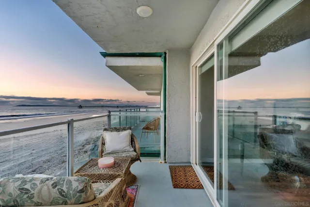 a view of balcony with furniture