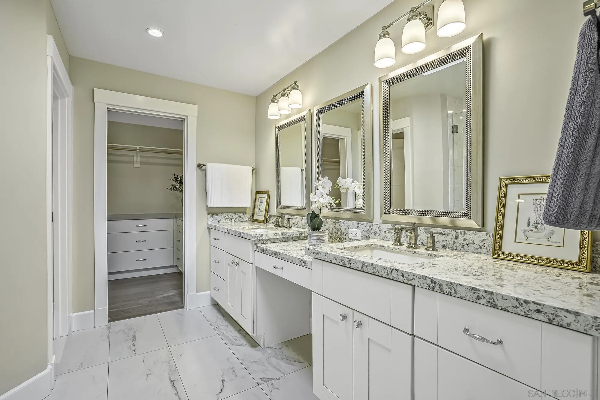 2826 Palomino Circle La Jolla, CA 92037 - Photo 14 of 34 a spacious bathroom with a granite countertop sink mirror and a