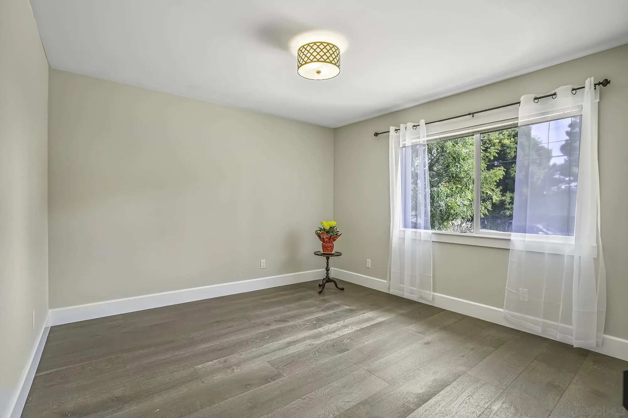 2826 Palomino Circle La Jolla, CA 92037 - Photo 18 of 34 a view of a room with a window and a ceiling fan
