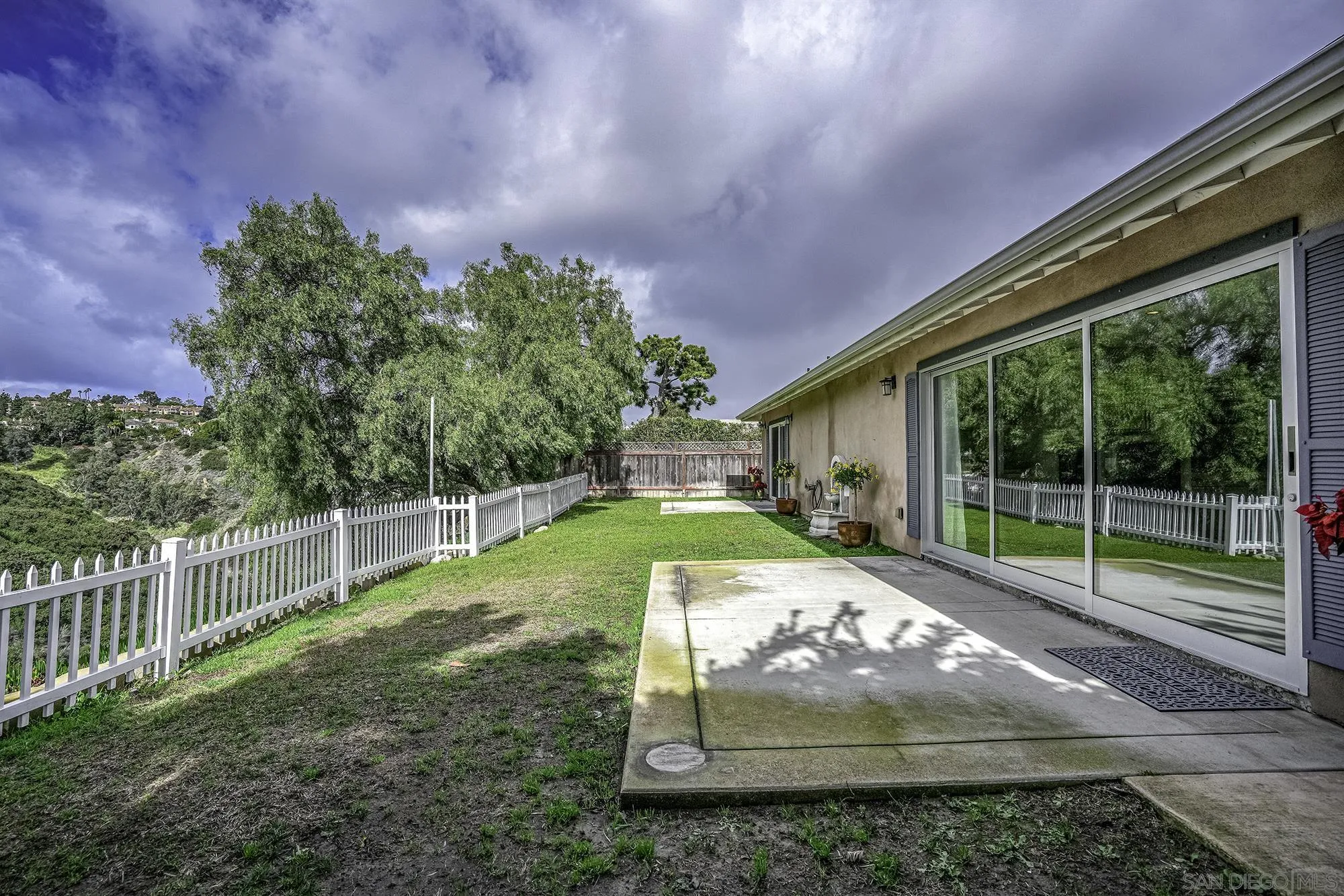 2826 Palomino Circle La Jolla, CA 92037 - Photo 24 of 34 a view of a backyard with a small cabin
