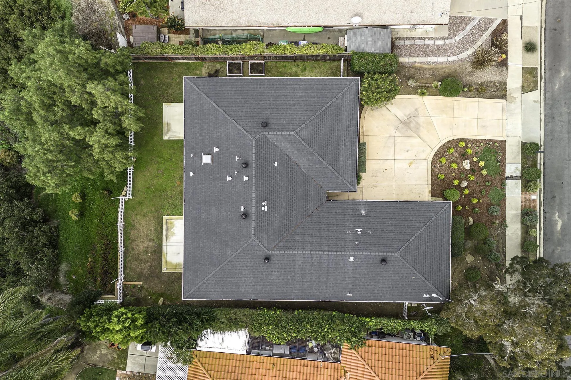 2826 Palomino Circle La Jolla, CA 92037 - Photo 30 of 34 an aerial view of a house with a yard and a large tree