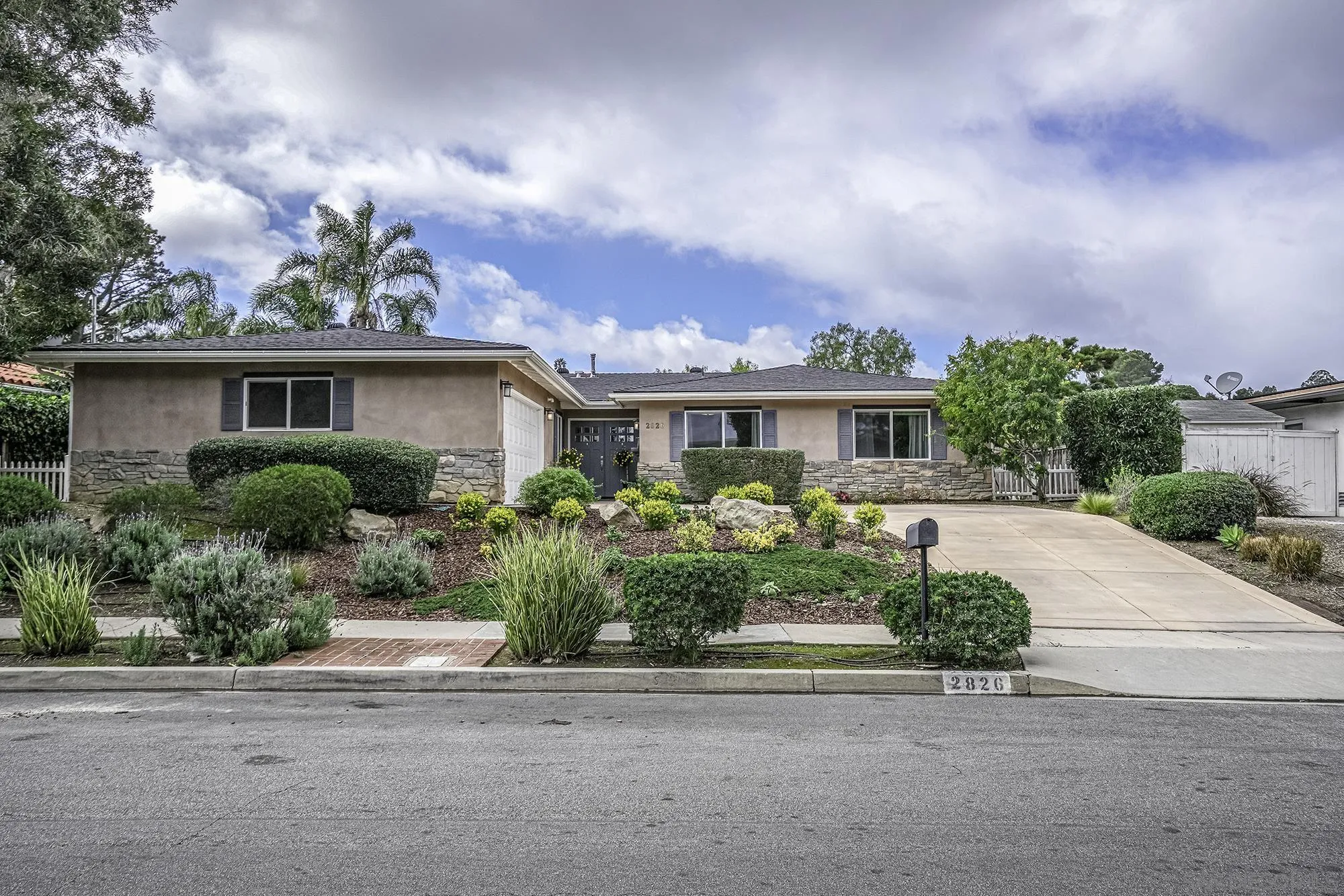 2826 Palomino Circle La Jolla, CA 92037 - Photo 5 of 34 front view of house with potted plants and a yard