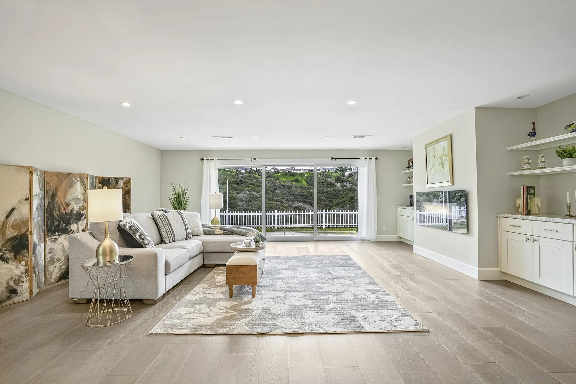 2826 Palomino Circle La Jolla, CA 92037 - Photo 7 of 34 a living room with furniture and a large window