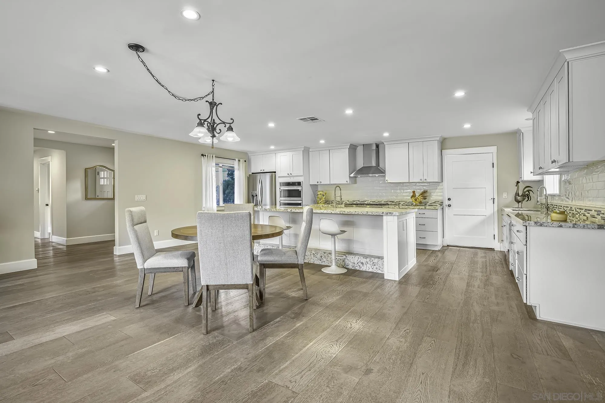 2826 Palomino Circle La Jolla, CA 92037 - Photo 10 of 34 a large kitchen with a table and chairs