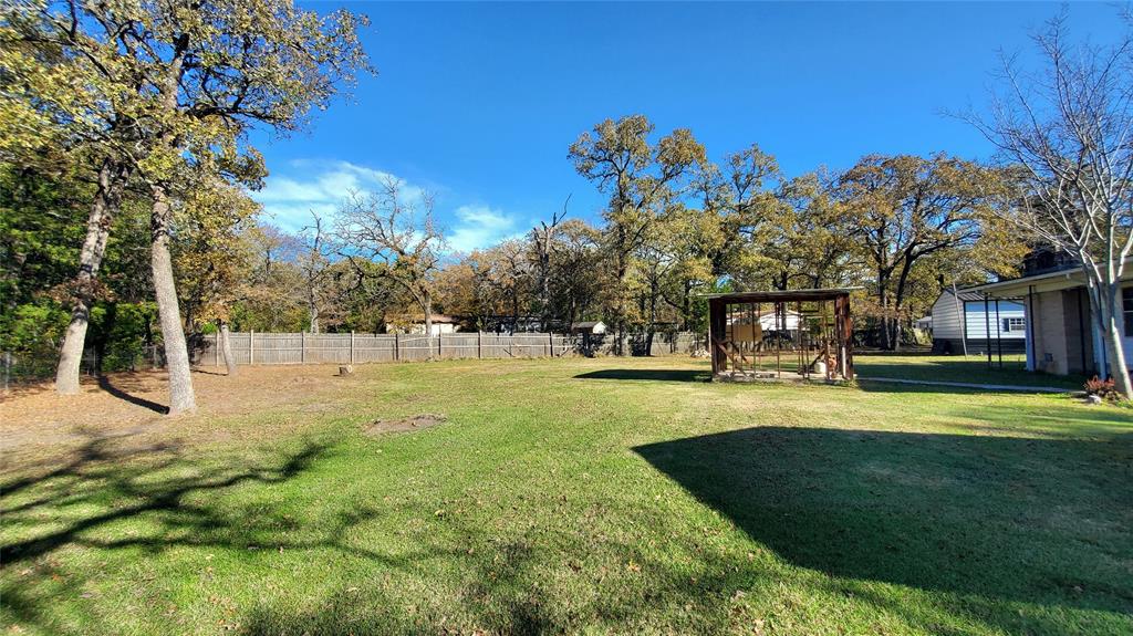 310 County Road 2406 Tool, TX 75143 - Photo 14 of 26 a view of a house with a yard