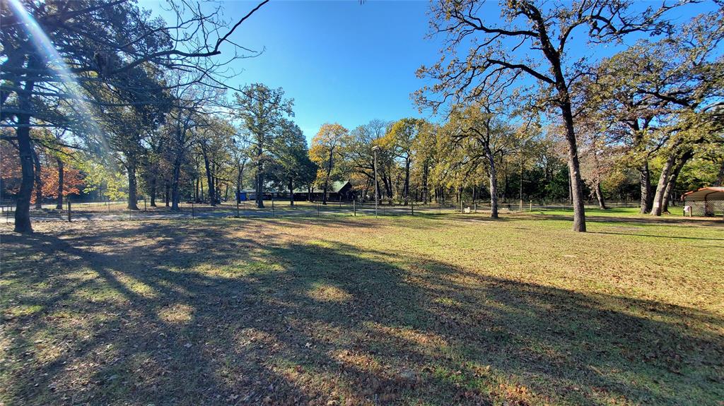 310 County Road 2406 Tool, TX 75143 - Photo 9 of 26 a view of tennis ground with trees