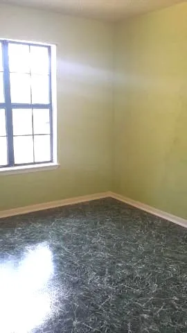 an empty room with a window