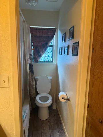 a bathroom with a toilet and a sink