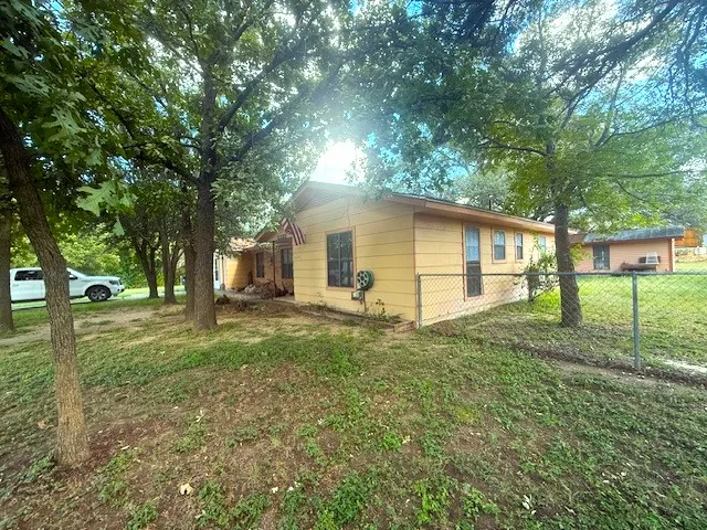 a house view with a garden space