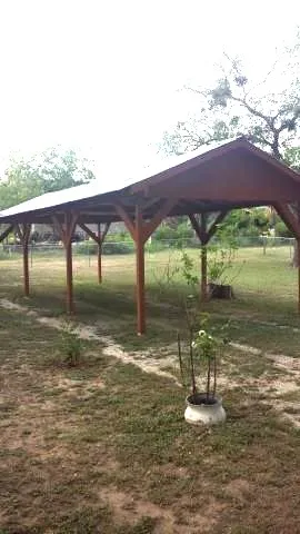 a view of swimming pool with a yard