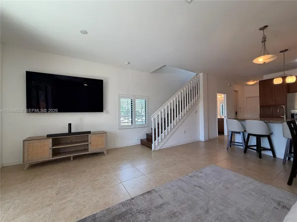 a bathroom with a sink and a window