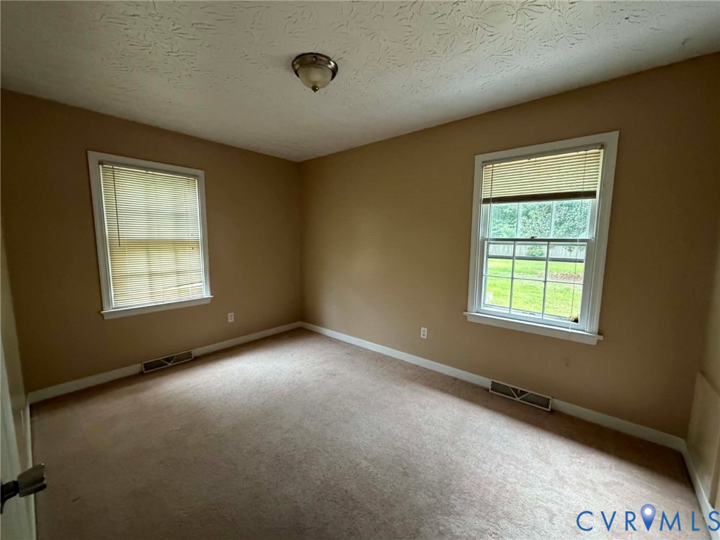 3766 Venter Road Aylett, VA 23009 - Photo 15 of 28 Carpeted room featuring two windows with white tri