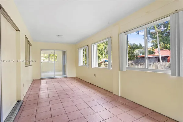 a view of an empty room with window