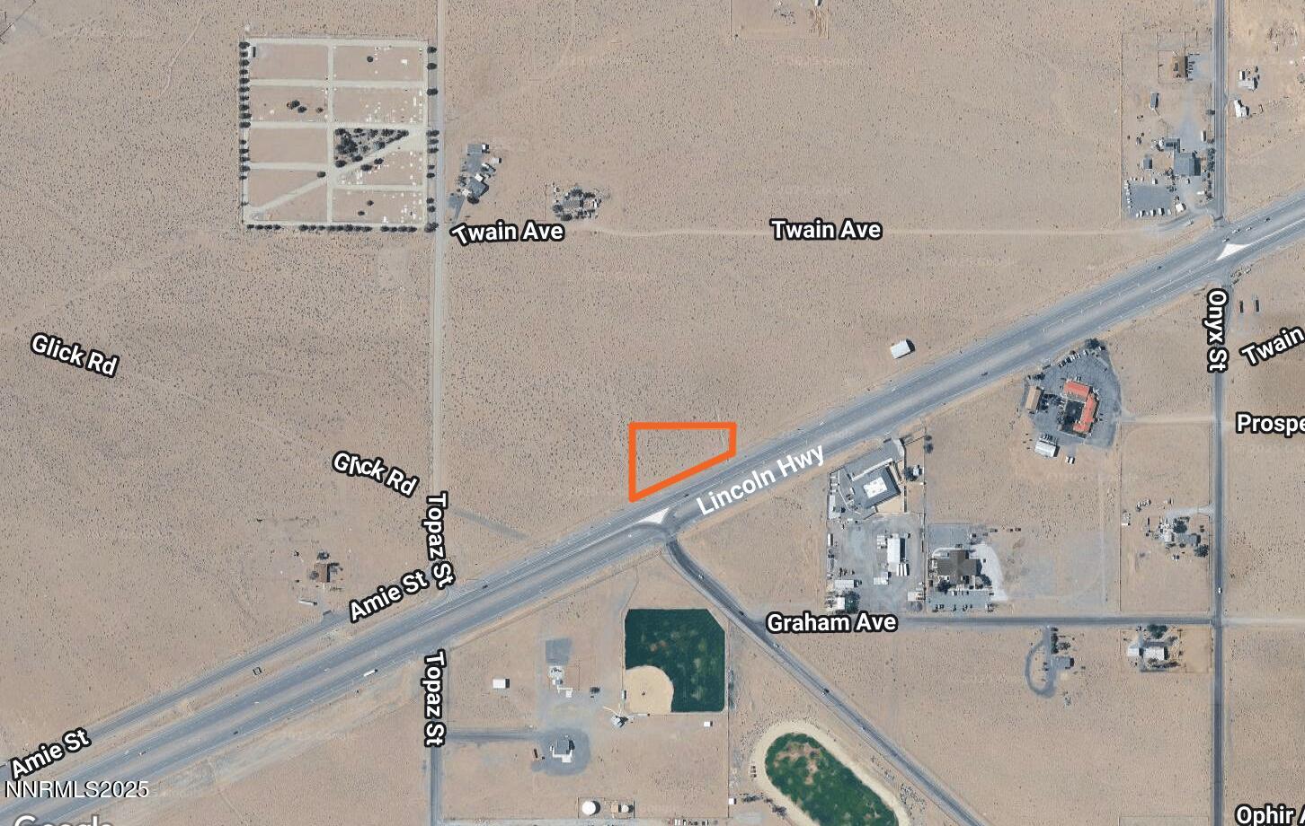 3845 Twain Avenue Silver Springs, NV 89429 - Photo 2 of 4 a bathroom with a mirror and a shower