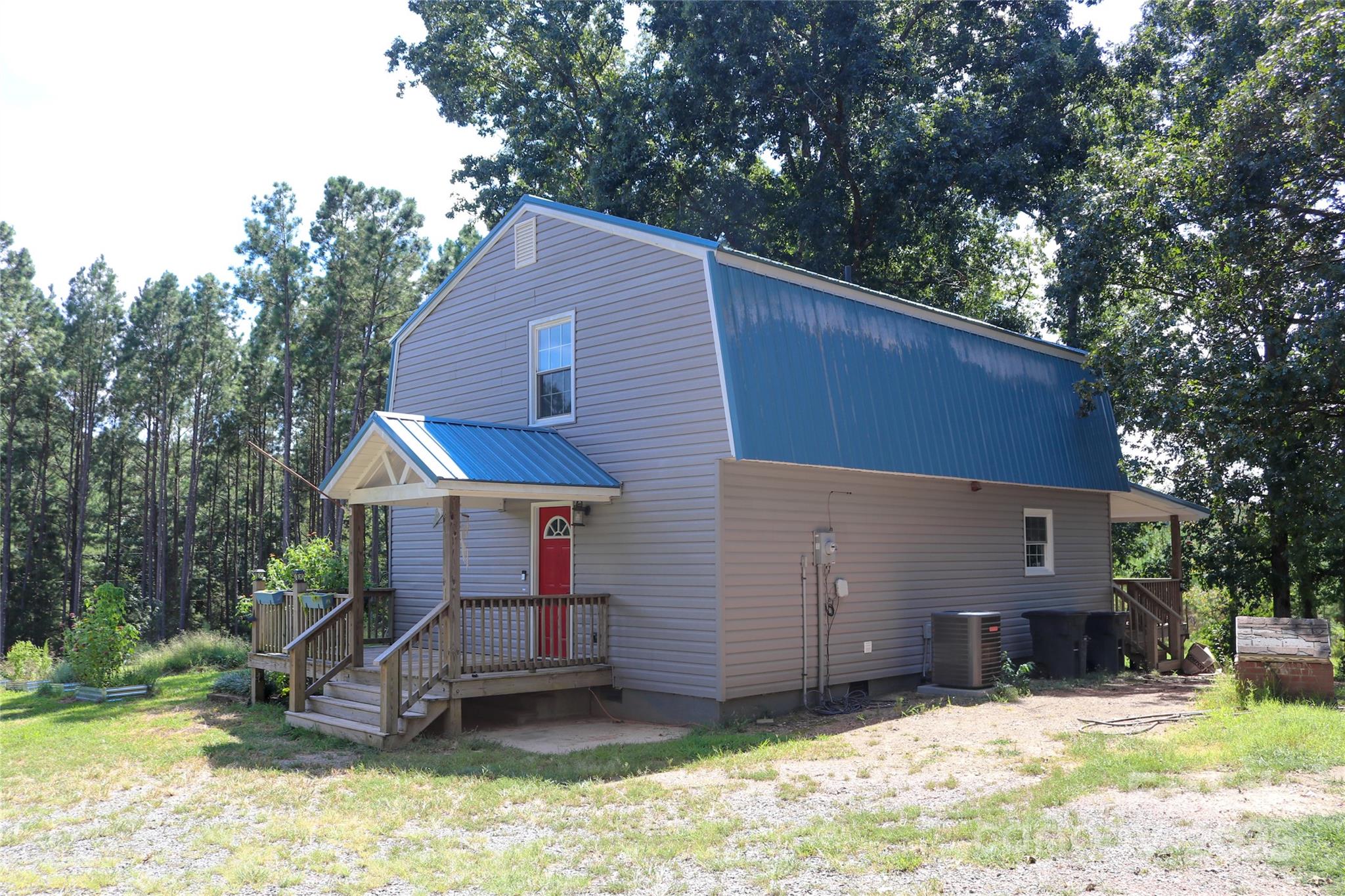 368 Gaddy Farm Road Mount Gilead, NC 27306 - Photo 5 of 25 a house that has a tree in it