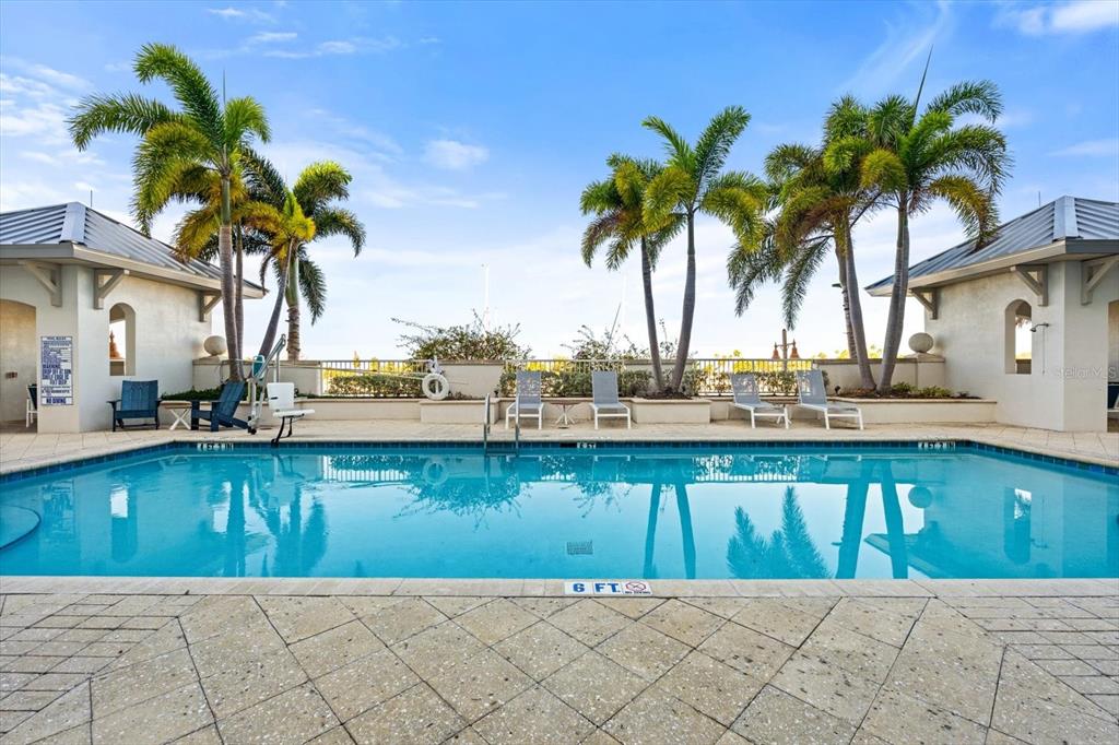 536 Bahia Beach Boulevard, Unit 222B Ruskin, FL 33570 - Photo 18 of 31 a view of a swimming pool with a patio