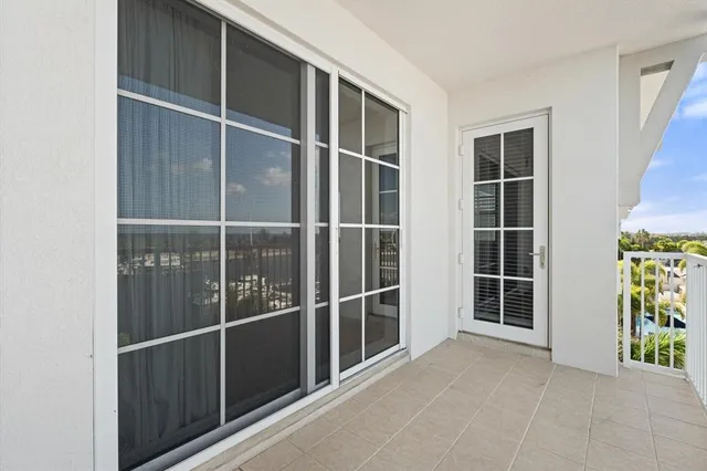 a view of empty room with windows