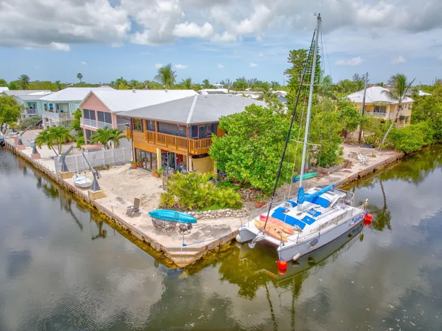 a view of a lake with a building in the background
