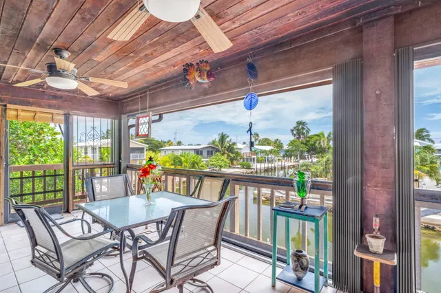 a view of an outdoor dining space with furniture