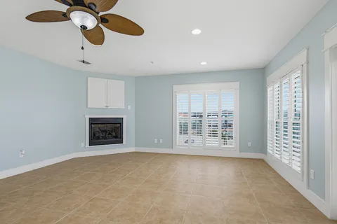 a kitchen with cabinets and stainless steel appliances