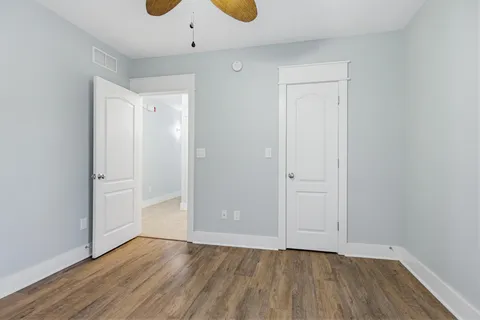 a view of a bathroom from the hallway