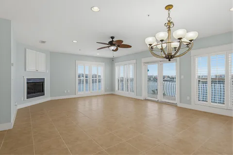 a kitchen with stainless steel appliances granite countertop a sink stove and microwave