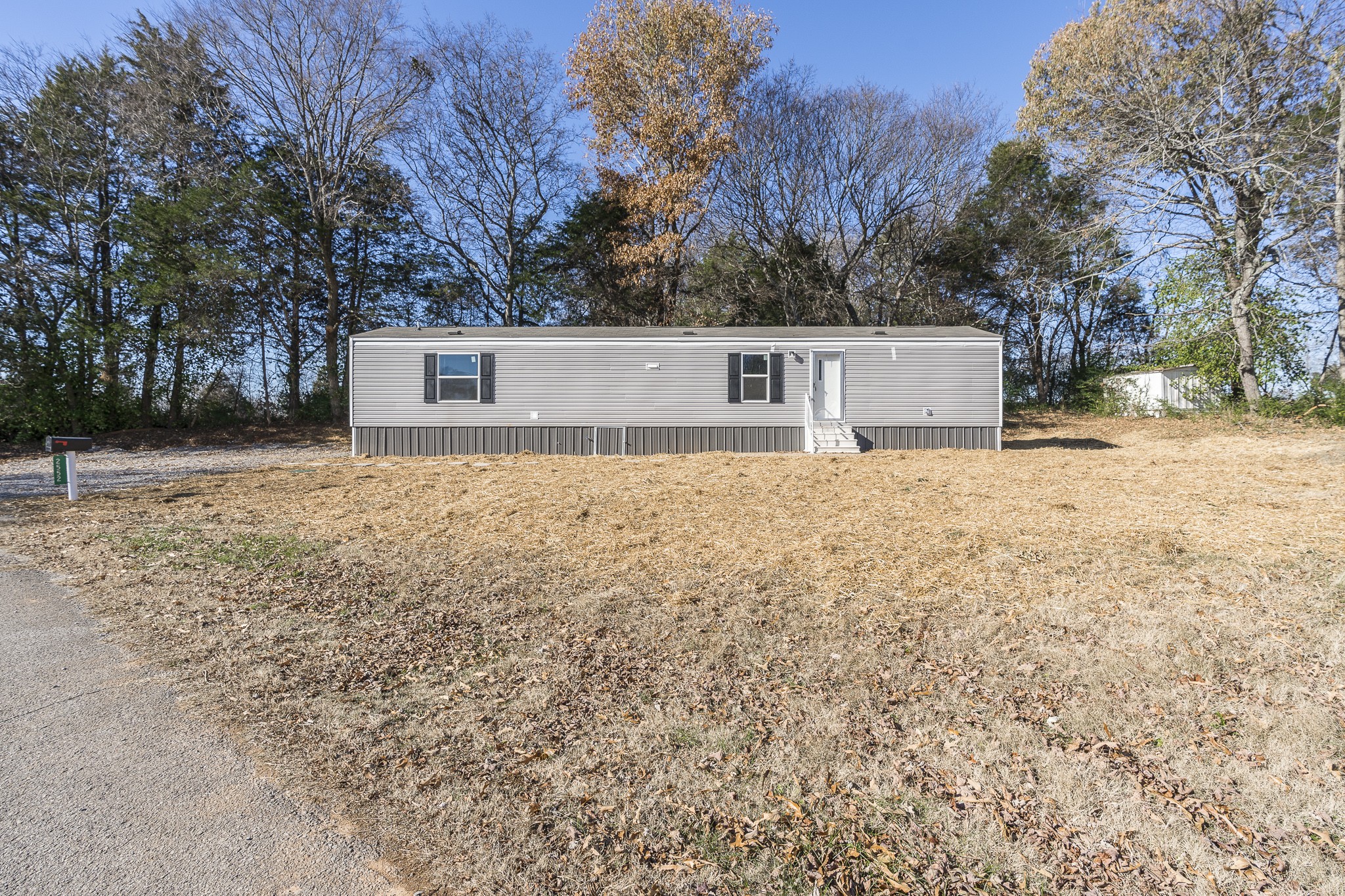 2552 Spring Street Pleasant View, TN 37146 - Photo 1 of 27 a view of a house with a yard