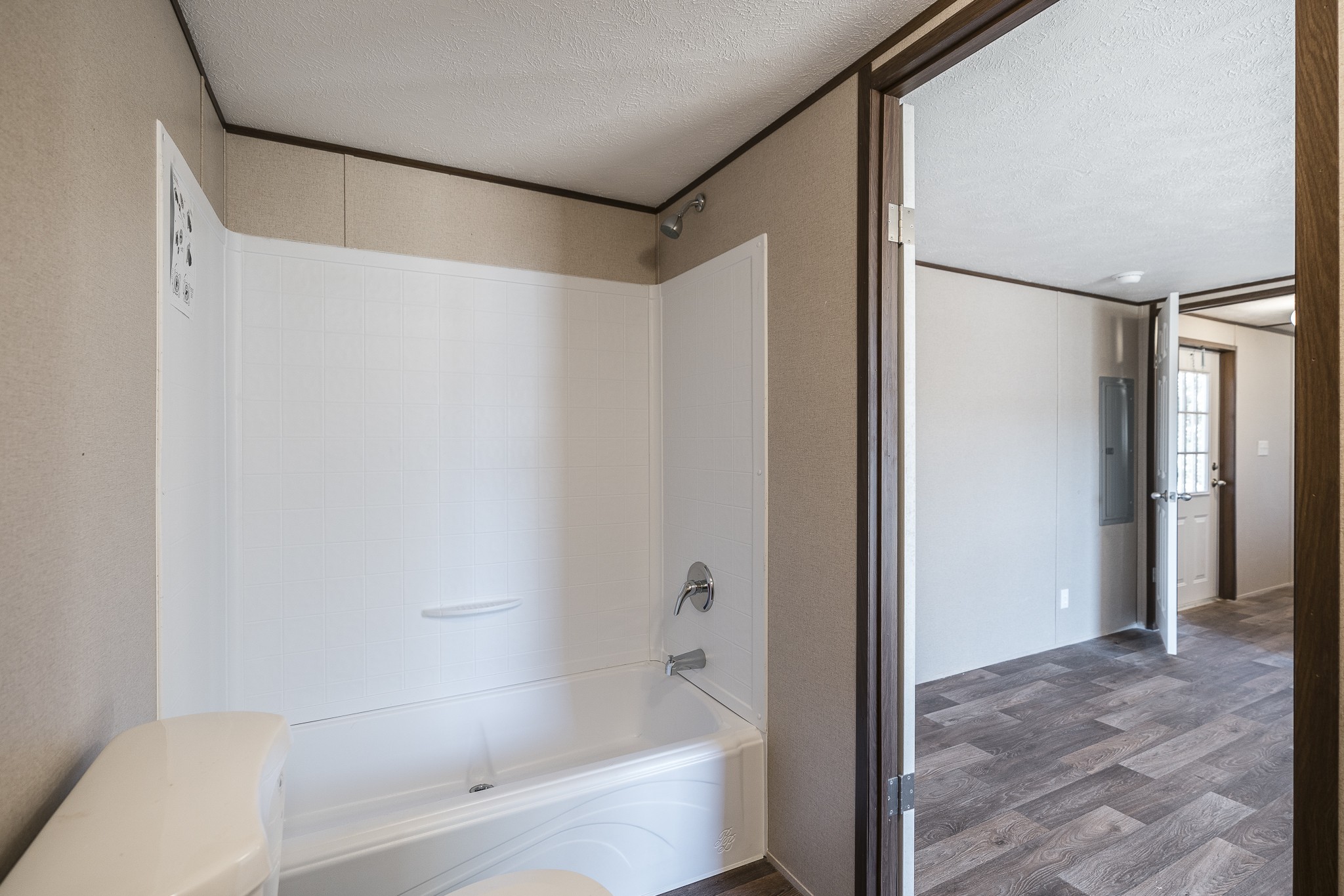 2552 Spring Street Pleasant View, TN 37146 - Photo 19 of 27 a bathroom with a bathtub and a shower