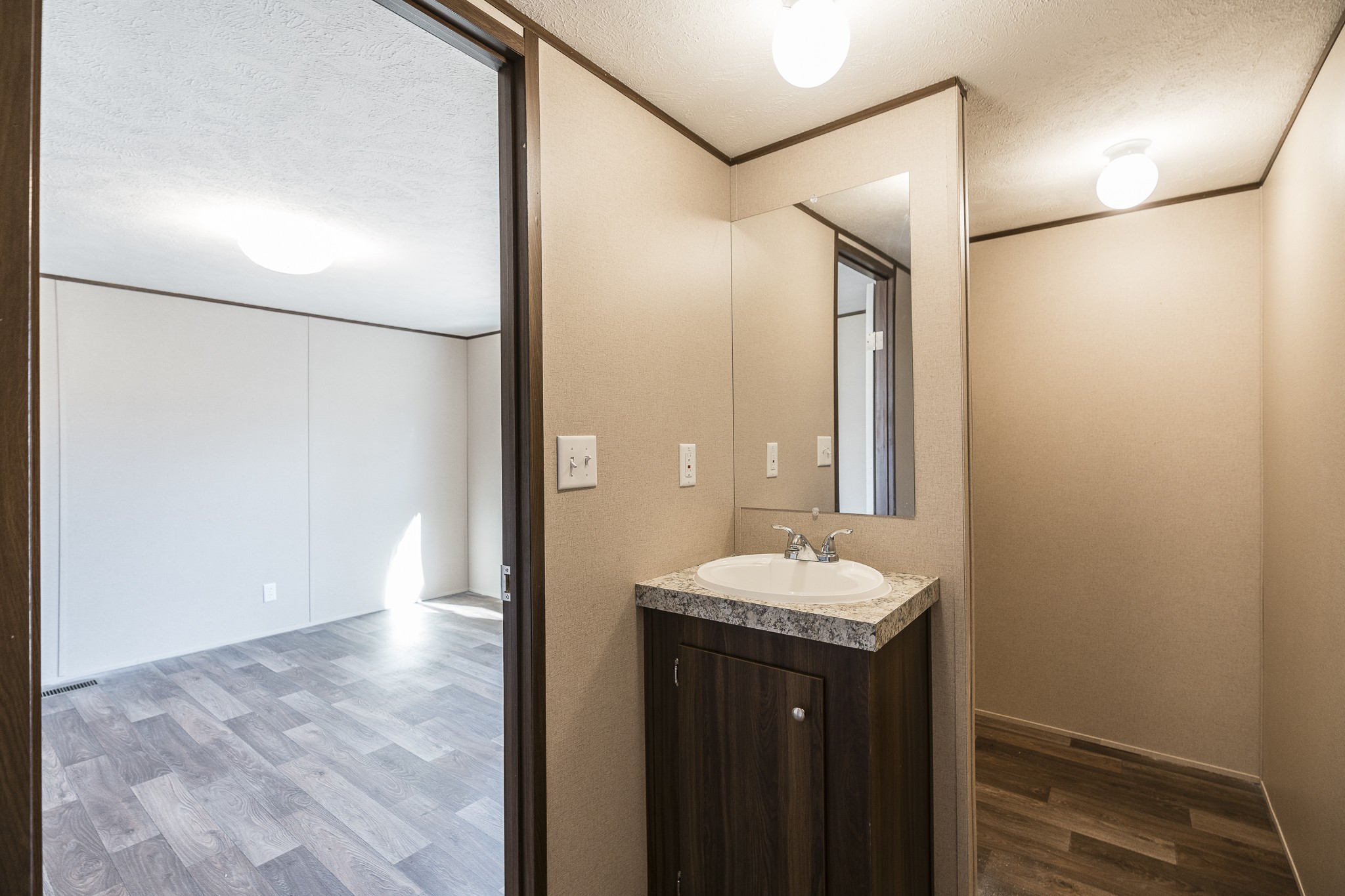 2552 Spring Street Pleasant View, TN 37146 - Photo 20 of 27 a bathroom with a granite countertop sink and a mirror
