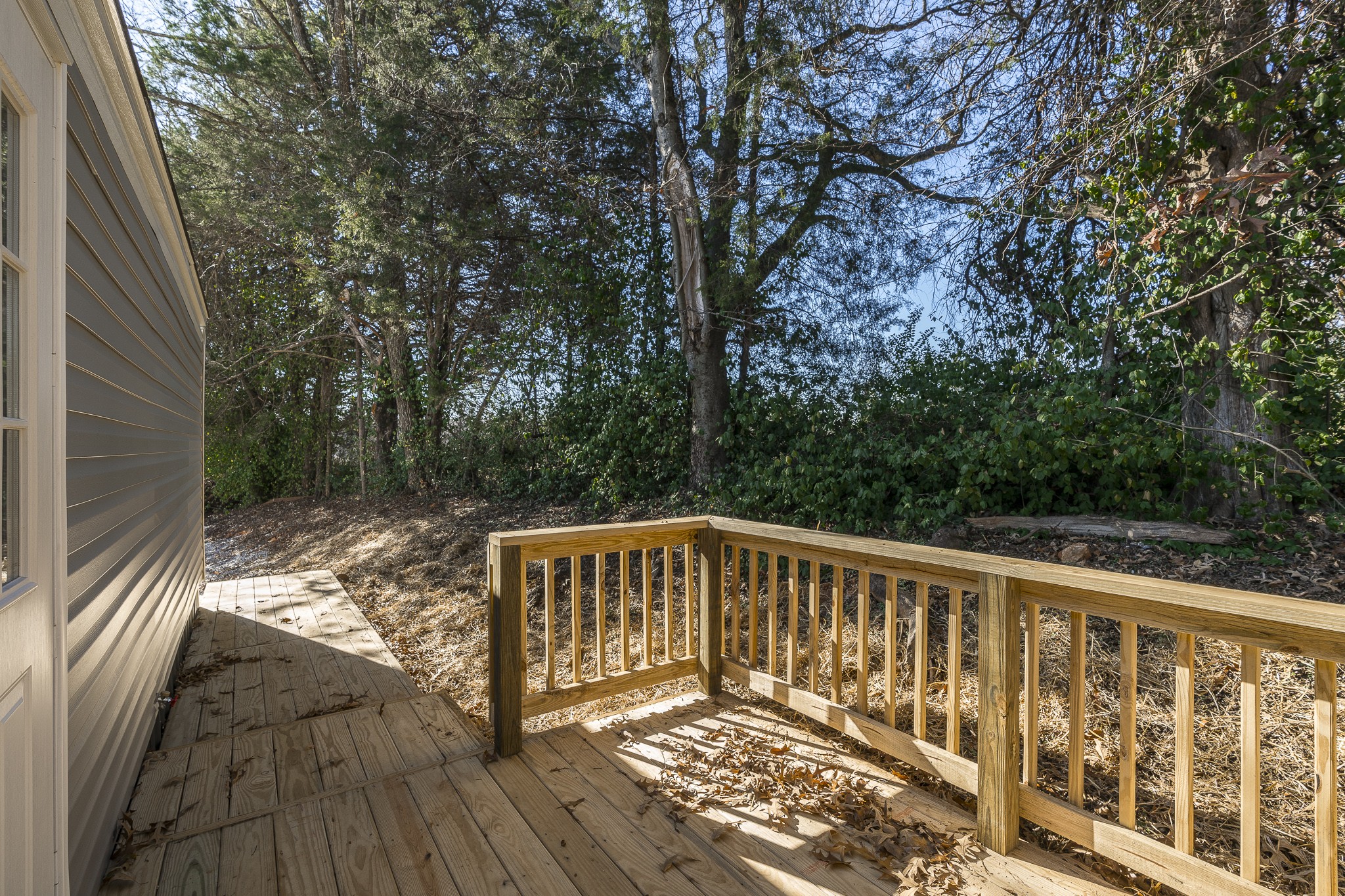 2552 Spring Street Pleasant View, TN 37146 - Photo 5 of 27 a view of balcony with wooden floor and fence