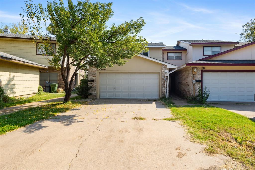 a view of a backyard of the house