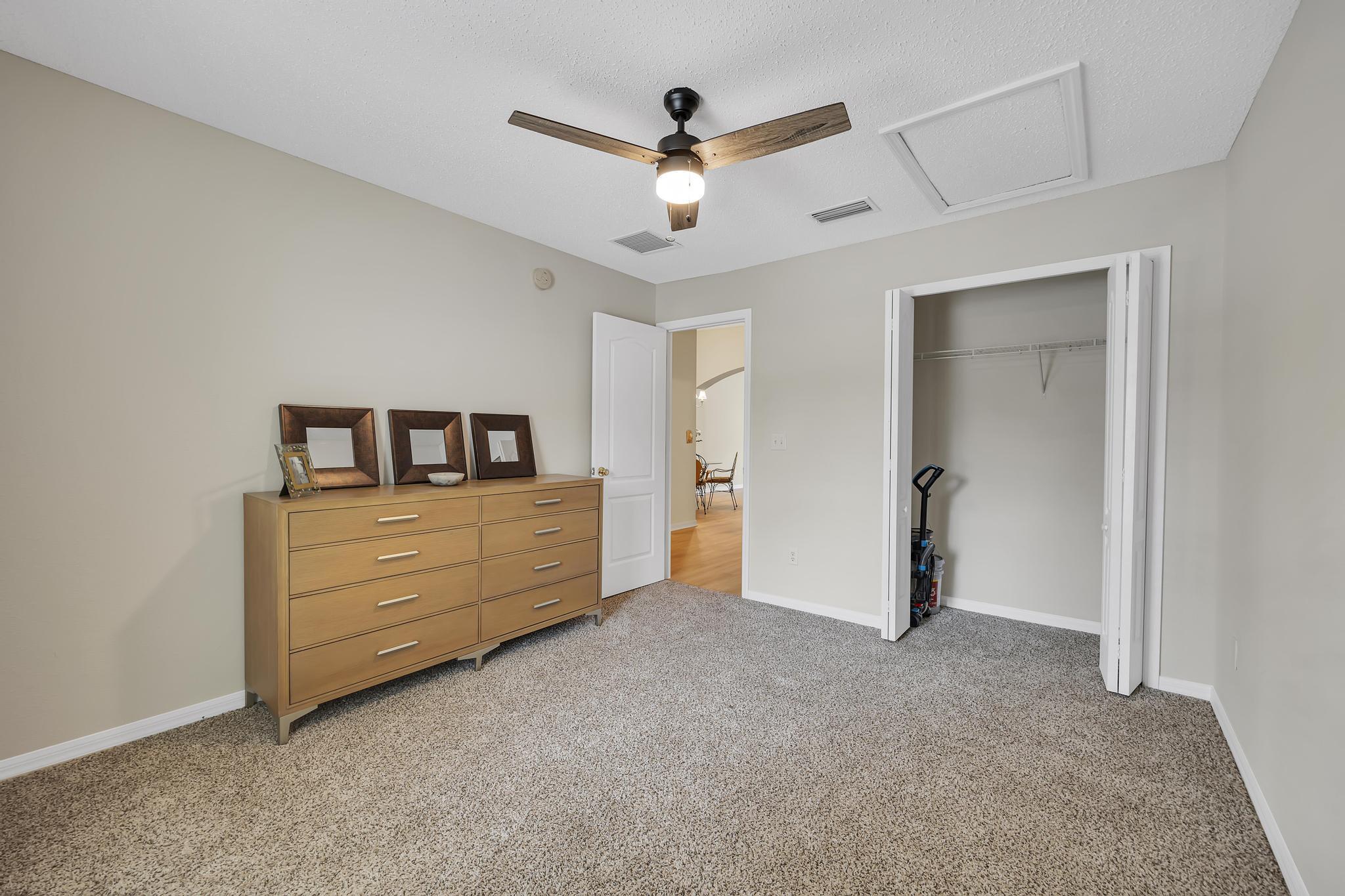 724 Ginger Mill Drive St. Johns, FL 32259 - Photo 17 of 54 a living room with closet