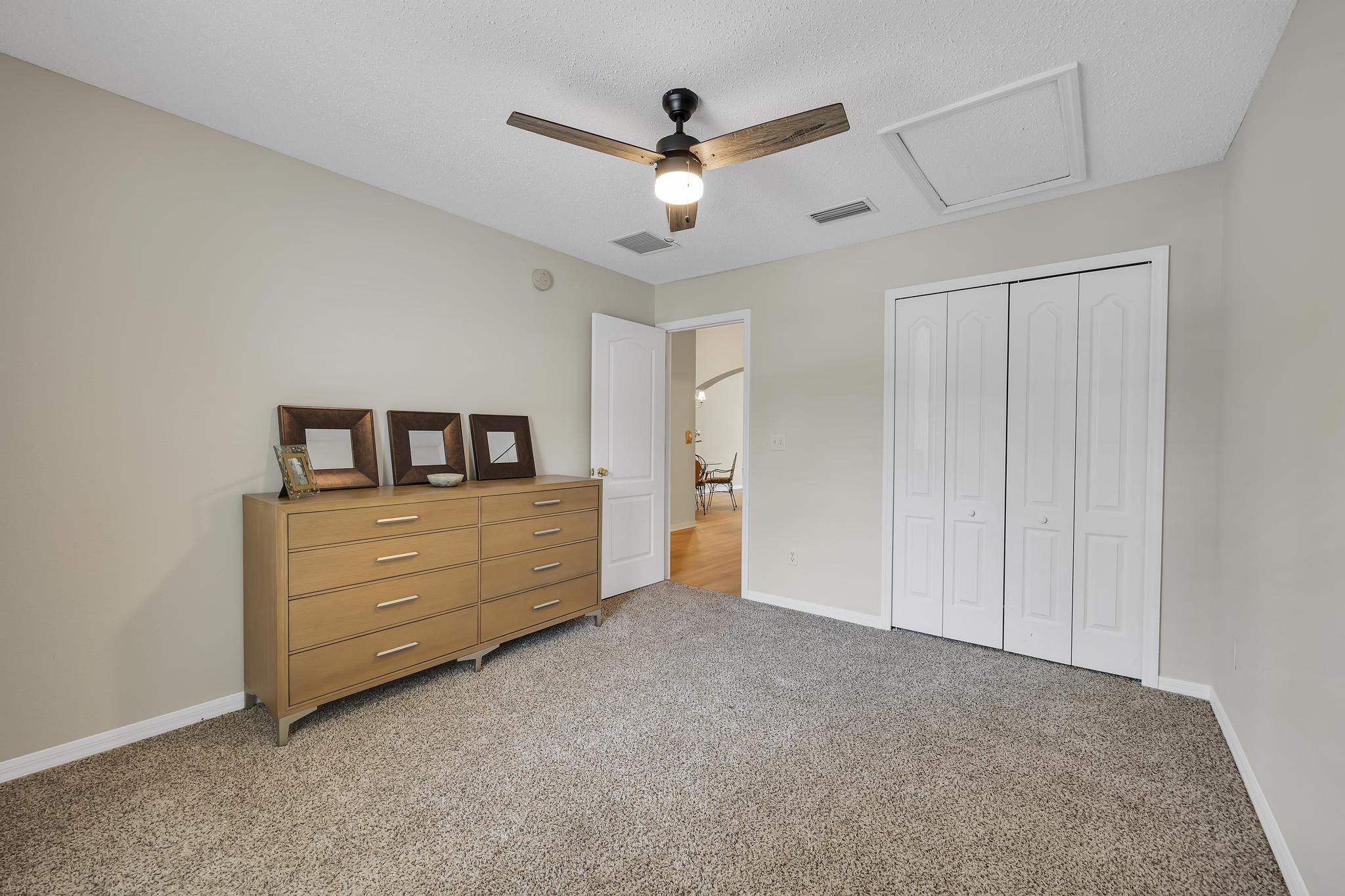 724 Ginger Mill Drive St. Johns, FL 32259 - Photo 18 of 54 a living room with closet