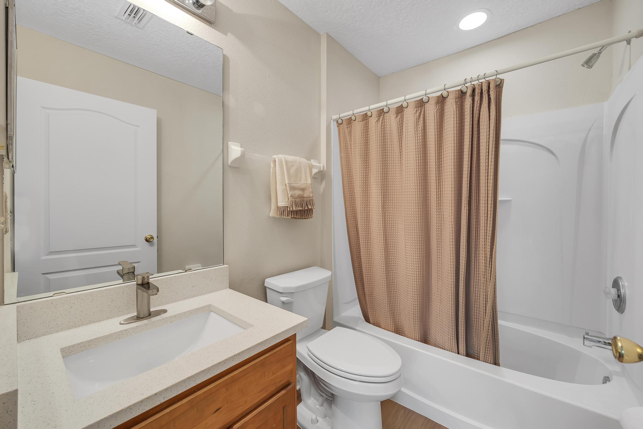 724 Ginger Mill Drive St. Johns, FL 32259 - Photo 22 of 54 a bathroom with a sink toilet and shower