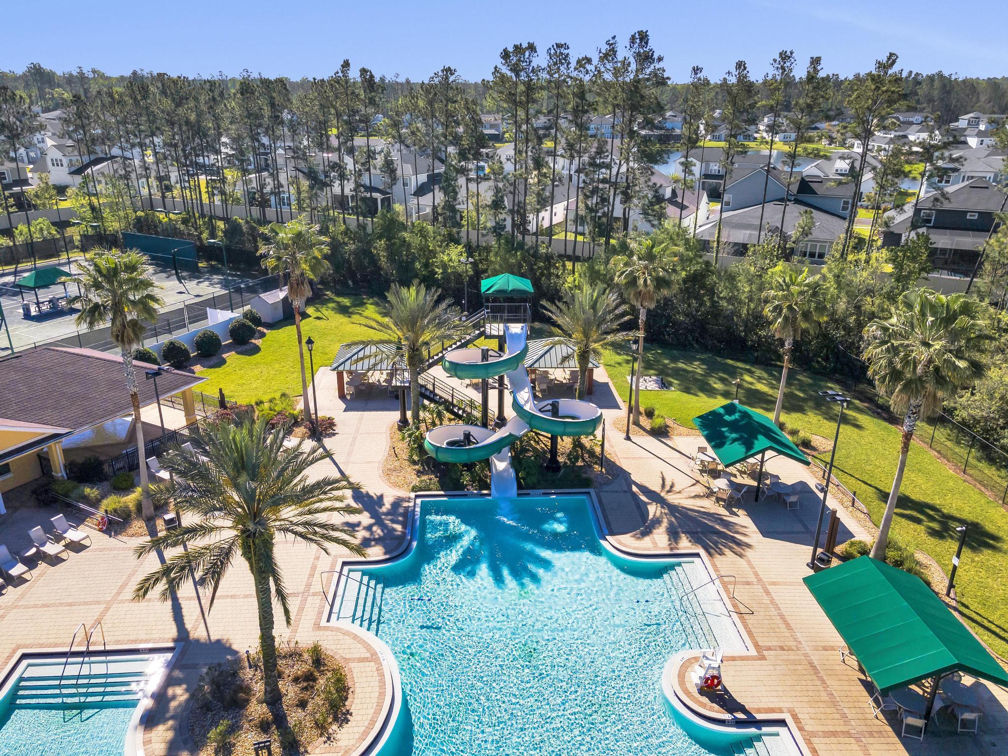 724 Ginger Mill Drive St. Johns, FL 32259 - Photo 32 of 54 an aerial view of a swimming pool patio swimming pool and outdoor seating