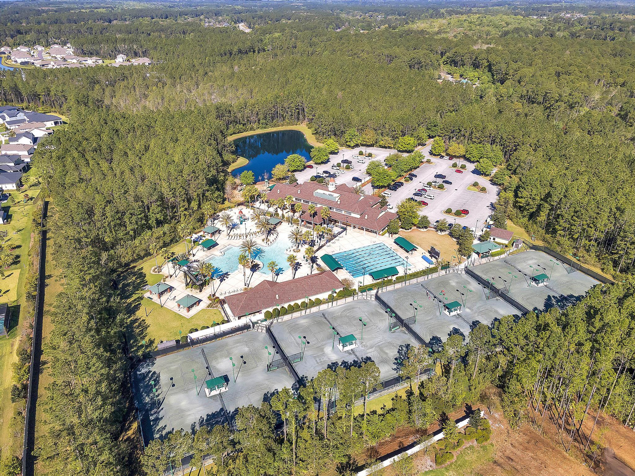 724 Ginger Mill Drive St. Johns, FL 32259 - Photo 38 of 54 an aerial view of a residential houses with outdoor space