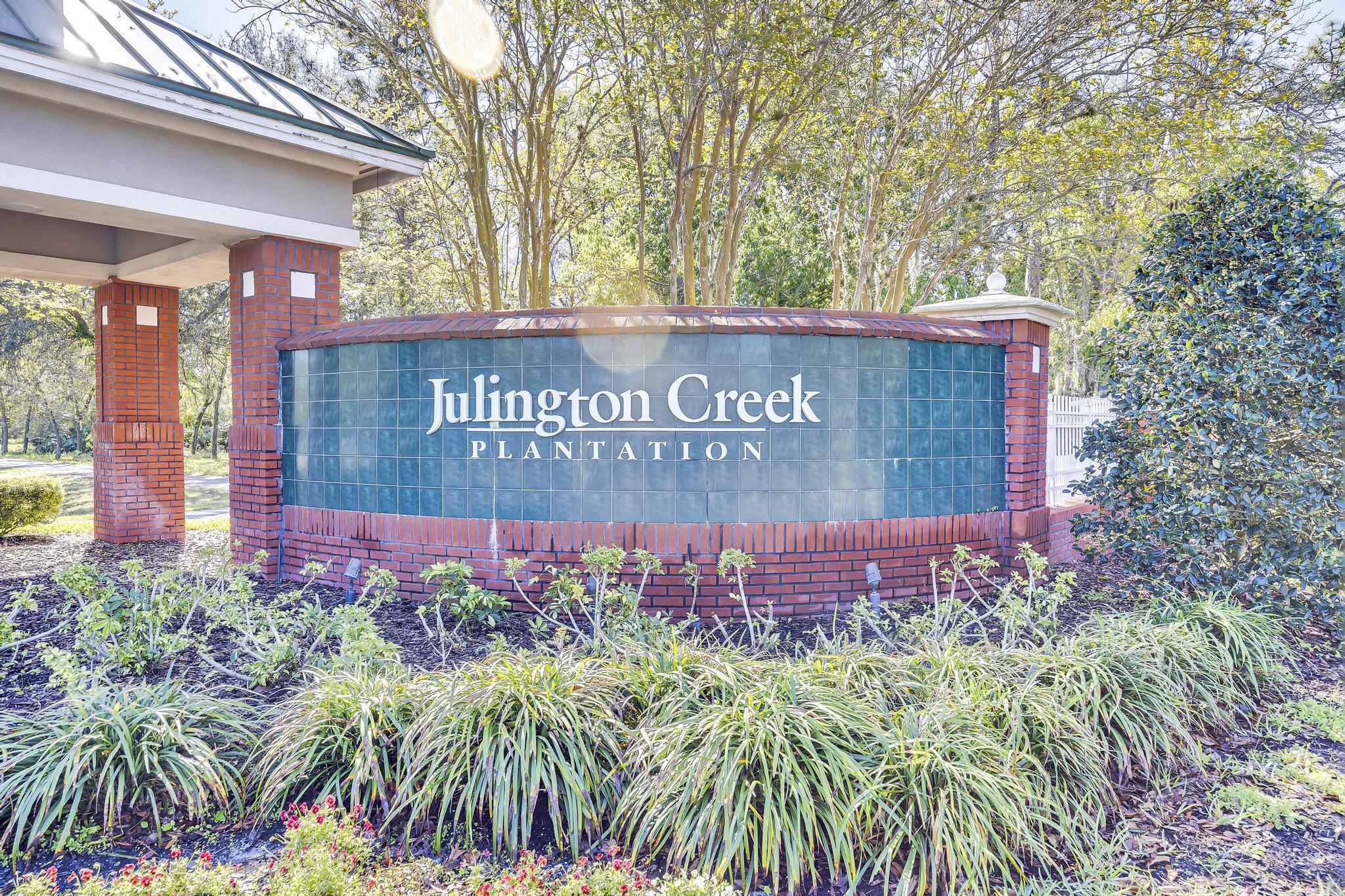 724 Ginger Mill Drive St. Johns, FL 32259 - Photo 45 of 54 a view of outdoor space with signage and flags