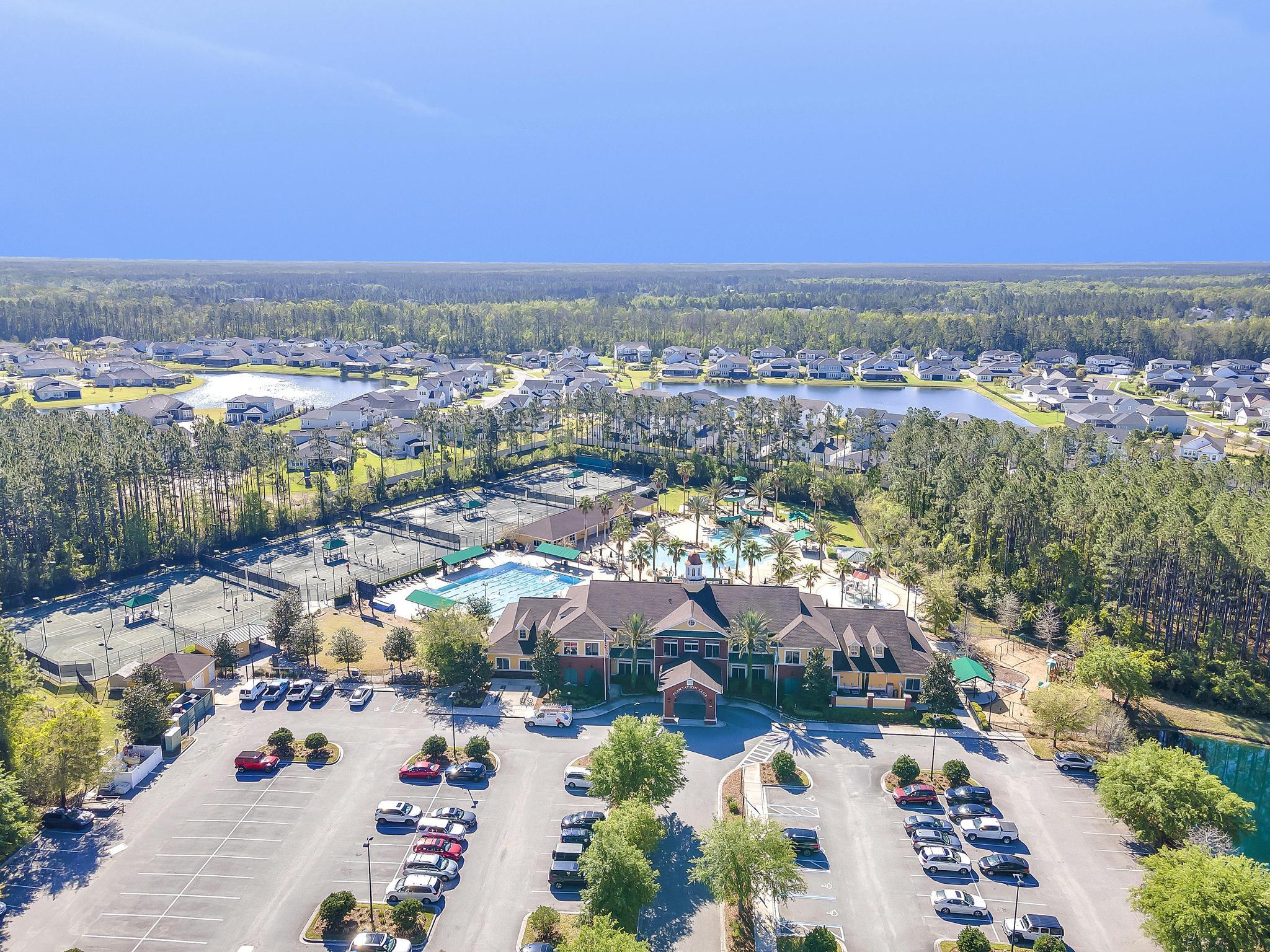 724 Ginger Mill Drive St. Johns, FL 32259 - Photo 48 of 54 an aerial view of a city with lots of residential buildings