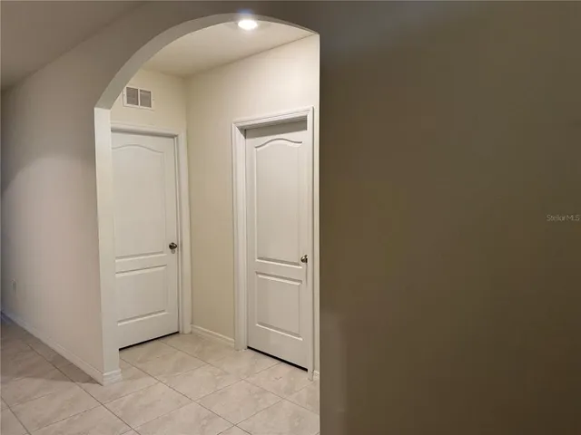 an empty room with closet