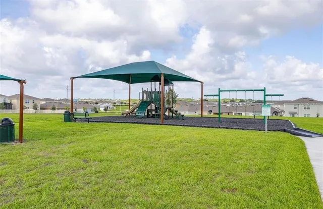 a view of a garden with a slide