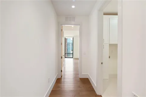 a bathroom with a bathtub and shower