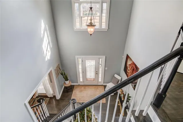 a view of an entryway with wooden floor