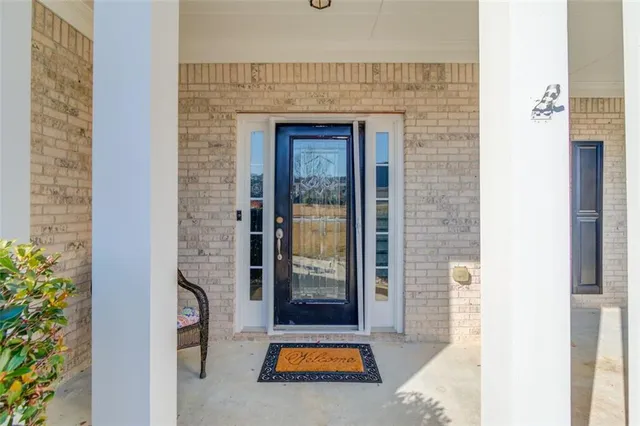 a bathroom with a tub and shower
