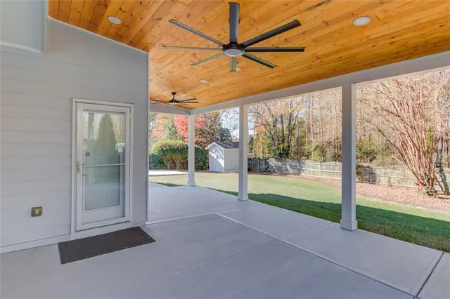 a view of backyard with green space