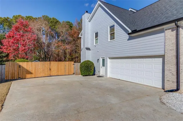 a view of a house with a garage