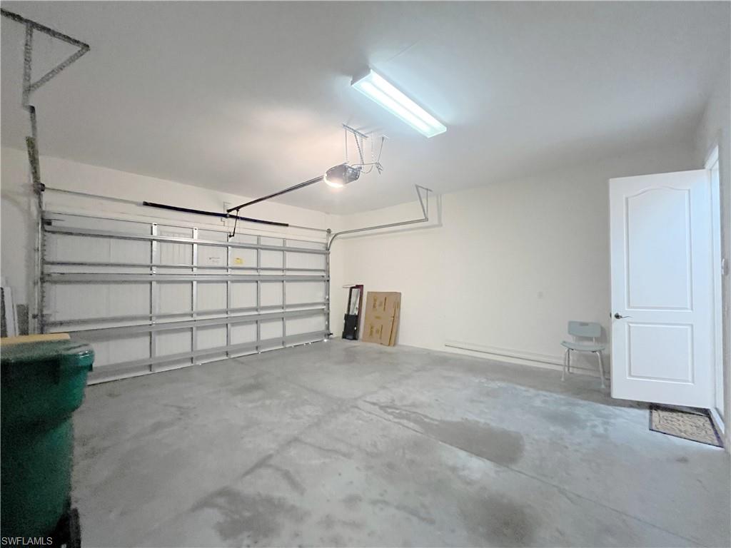 1366 Serrano Circle Naples, FL 34105 - Photo 30 of 30 a view of a garage