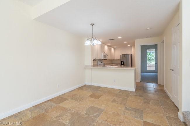 8108 Josefa Way Naples, FL 34114 - Photo 12 of 40 a view of a kitchen with a sink