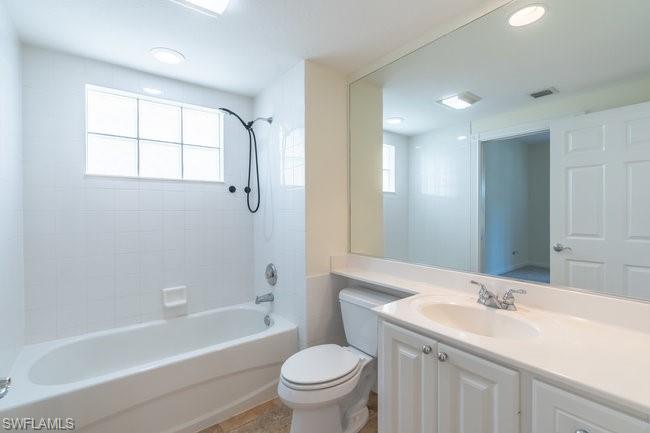 8108 Josefa Way Naples, FL 34114 - Photo 17 of 40 a bathroom with a sink a toilet and a bathtub
