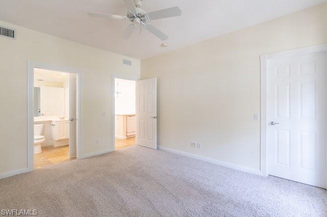 8108 Josefa Way Naples, FL 34114 - Photo 19 of 40 a view of an empty room with a window