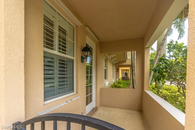 8108 Josefa Way Naples, FL 34114 - Photo 21 of 40 a view of balcony with potted plants